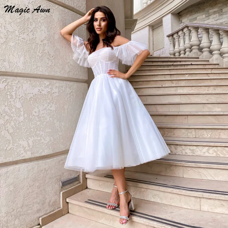 Magic Awn Boho White Wedding Dresses Tea-Length Off The Shoulder Illusion A-Line Short Beach Bridal Gowns For Women Vestidos
Magic Awn Boho White Wedding Dresses Tea-Length Off The Shoulder Illusion A-Line Short Beach Bridal Gowns For Women Vestidos