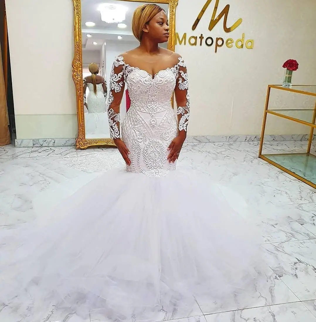 2025 African Wedding Dresses Long Sleeves Sheer Neck Lace Beads Mermaid Bridal Bride Gowns Vestidos De Noiva Mariage
2025 African Wedding Dresses Long Sleeves Sheer Neck Lace Beads Mermaid Bridal Bride Gowns Vestidos De Noiva Mariage