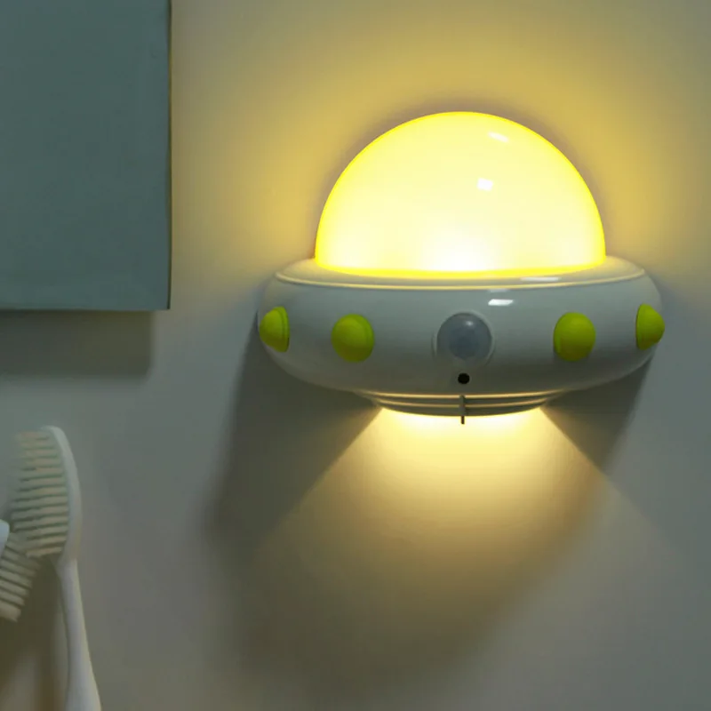 Creative UFO body sensor lights LED baby bedroom sleep remote control night light plug baby feeding table lamp
Creative UFO body sensor lights LED baby bedroom sleep remote control night light plug baby feeding table lamp