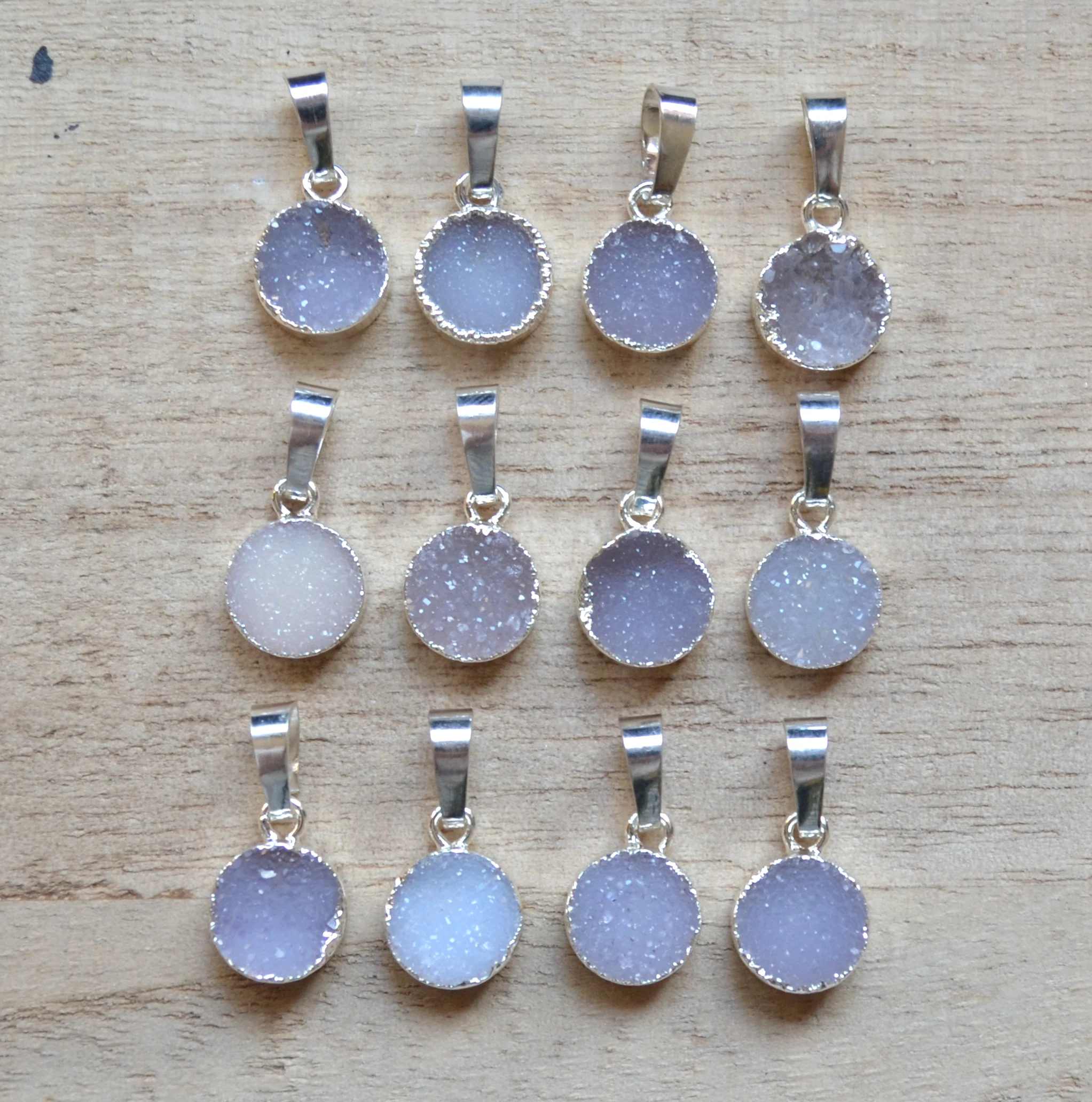 New 10 mm round druzy pendant ,crystal quartz pendants with Electroplated silvery edges
New 10 mm round druzy pendant ,crystal quartz pendants with Electroplated silvery edges