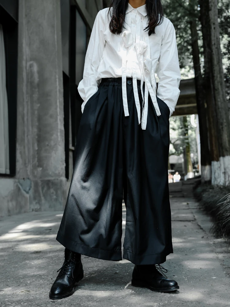 Мужские широкие брюки, брюки-клеш, весенне-осенние новые Yamamoto, свободные трендовые универсальные брюки большого размера с эластичной резинкой на талии
Мужские широкие брюки, брюки-клеш, весенне-осенние новые Yamamoto, свободные трендовые универсальные брюки большого размера с эластичной резинкой на талии