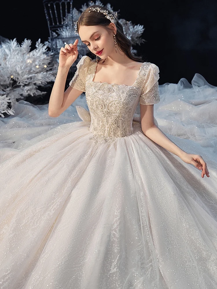 Luxury Saudi Arabia Wedding Dresses Square Collar Short Sleeve Bling Crystal Beading Cathedral Train High-End Series Bride Gowns
Luxury Saudi Arabia Wedding Dresses Square Collar Short Sleeve Bling Crystal Beading Cathedral Train High-End Series Bride Gowns