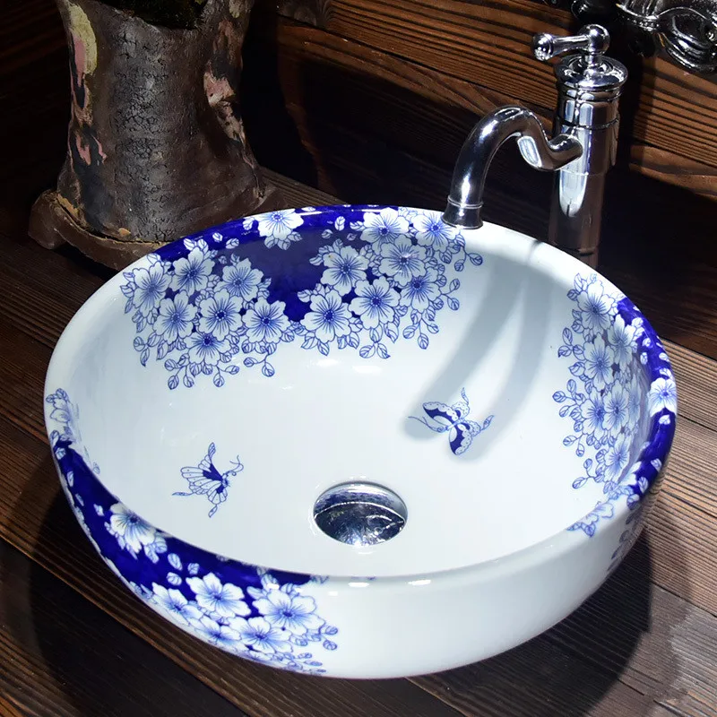 Jingdezhen factory directly art hand painted ceramic wash basin bathroom ceramic sinks blue and white
Jingdezhen factory directly art hand painted ceramic wash basin bathroom ceramic sinks blue and white