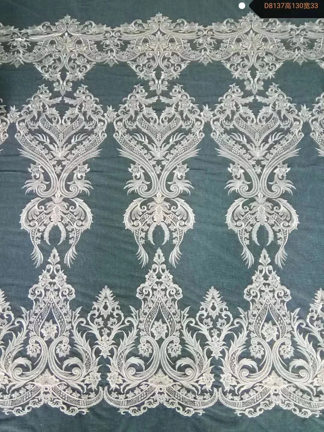 Hot sale low price ivory sequins embroidery lace fabric for wedding party dress
Hot sale low price ivory sequins embroidery lace fabric for wedding party dress