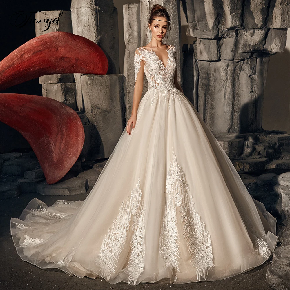 Traugel Chic Scoop A Line Lace Wedding Dresses Elegant Applique Long Sleeve Button Bride Dress Court Train Bridal Gown
Traugel Chic Scoop A Line Lace Wedding Dresses Elegant Applique Long Sleeve Button Bride Dress Court Train Bridal Gown