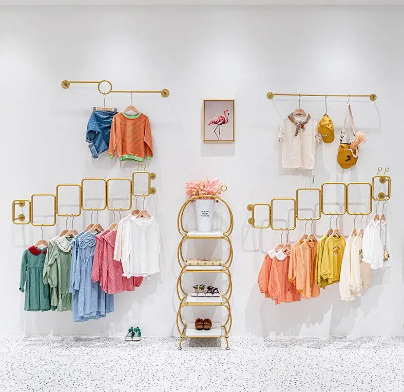 Children's clothing store wall-mounted side hanging creative children's clothing display rack wrought iron hangers.
Children's clothing store wall-mounted side hanging creative children's clothing display rack wrought iron hangers.