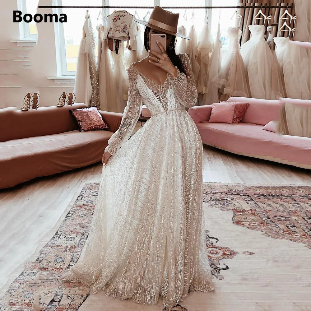 Сверкающее кружевное свадебное платье Booma с длинным рукавом и V-образным вырезом, а-силуэт, свадебные платья с открытой спиной, тюлевые Длинные платья для невесты
Сверкающее кружевное свадебное платье Booma с длинным рукавом и V-образным вырезом, а-силуэт, свадебные платья с открытой спиной, тюлевые Длинные платья для невесты