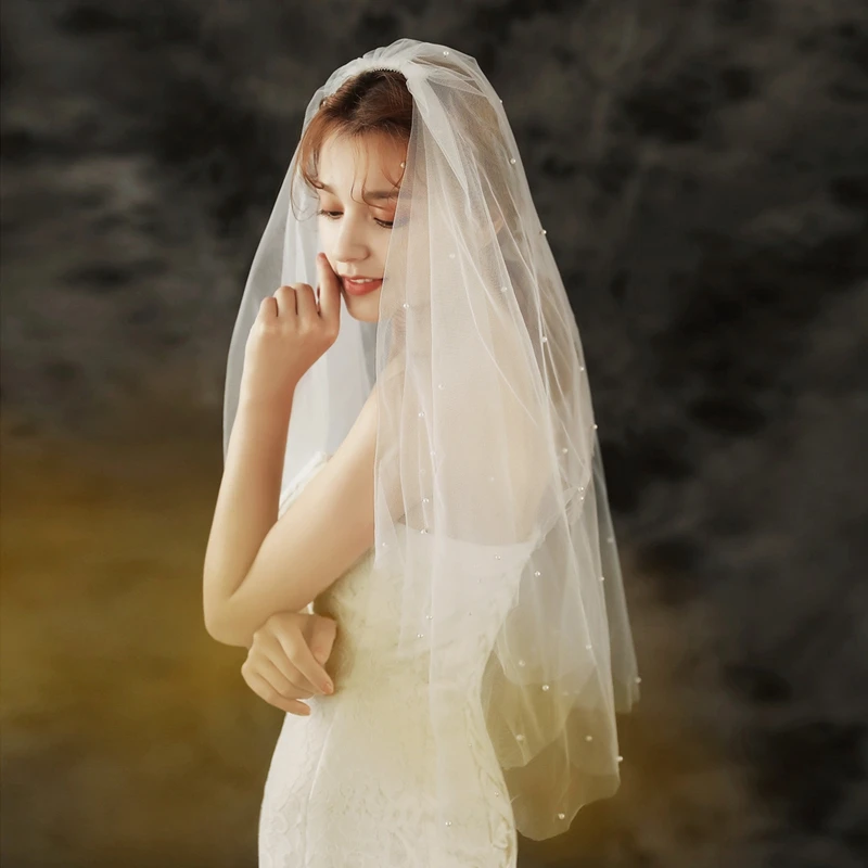White Ivory Bridal veils Beaded Pearls Wedding Veil Bride Mariage bridal headwear Wedding accessories Matrimonio Voile mariee
White Ivory Bridal veils Beaded Pearls Wedding Veil Bride Mariage bridal headwear Wedding accessories Matrimonio Voile mariee