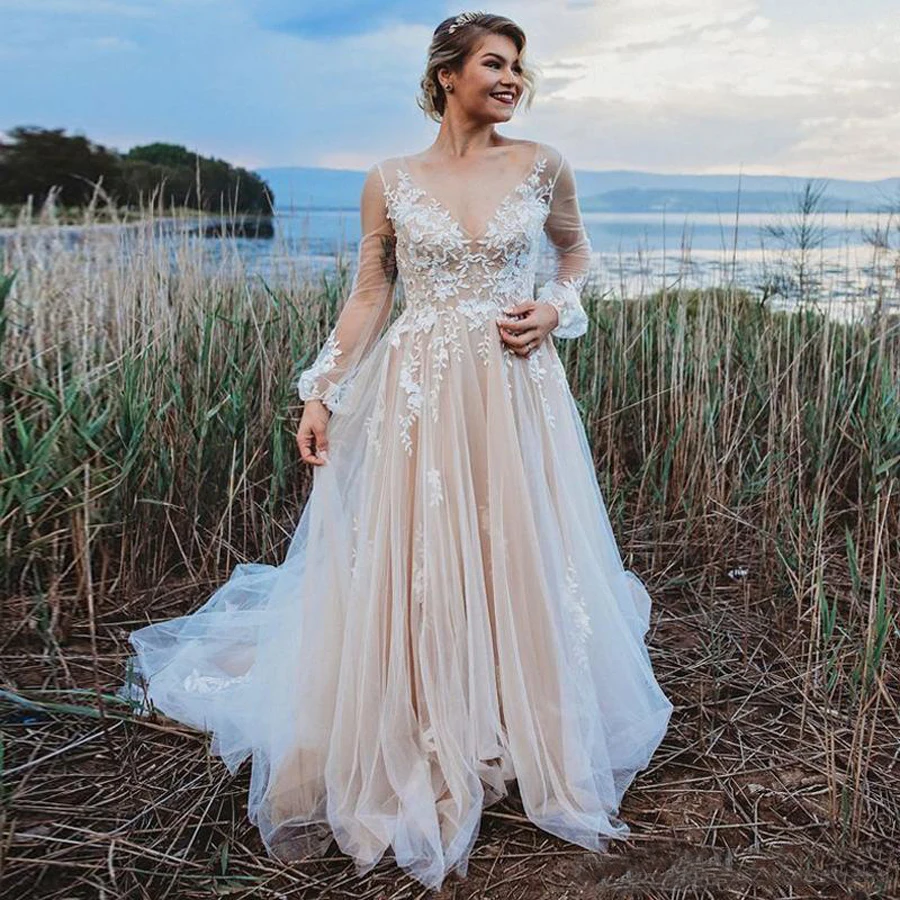 Champagne Wedding Gowns V-neck Applique Lace Long Sleeve Wedding Dresses Sexy Backless Tulle Vestido De Noiva
Champagne Wedding Gowns V-neck Applique Lace Long Sleeve Wedding Dresses Sexy Backless Tulle Vestido De Noiva