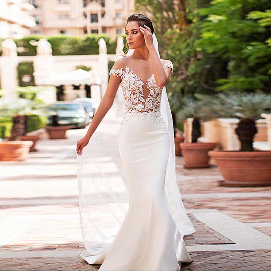 Vestidos de novia изысканные Прозрачные Свадебные платья из тюля Русалочки с рукавами-крылышками и кружевной аппликацией, сексуальное прозрачное свадебное платье
Vestidos de novia изысканные Прозрачные Свадебные платья из тюля Русалочки с рукавами-крылышками и кружевной аппликацией, сексуальное прозрачное свадебное платье