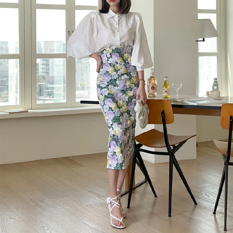 Women's Elegant Matching Sets Oversized Solid White Half Lantern Sleeves Shirt Floral Printed High Waist Wrapping Medium Skirt
Women's Elegant Matching Sets Oversized Solid White Half Lantern Sleeves Shirt Floral Printed High Waist Wrapping Medium Skirt