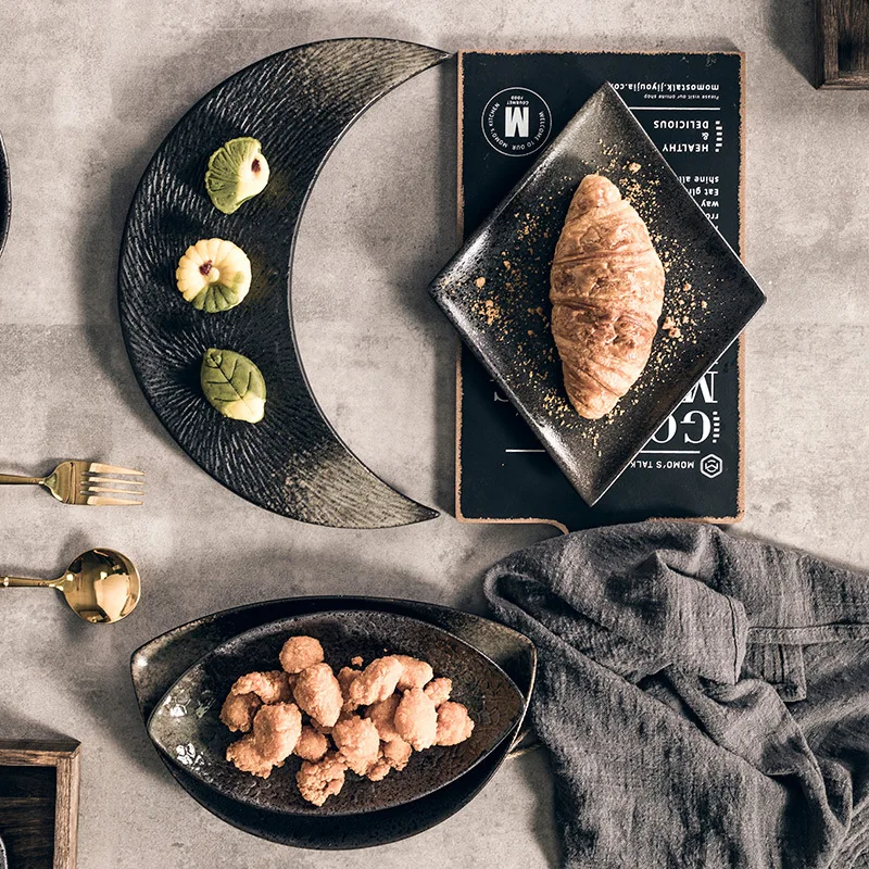 black retro ceramic tableware Sushi dish hot pot dish Hotel special-shaped barbecue dish restaurant for commercial use.
black retro ceramic tableware Sushi dish hot pot dish Hotel special-shaped barbecue dish restaurant for commercial use.