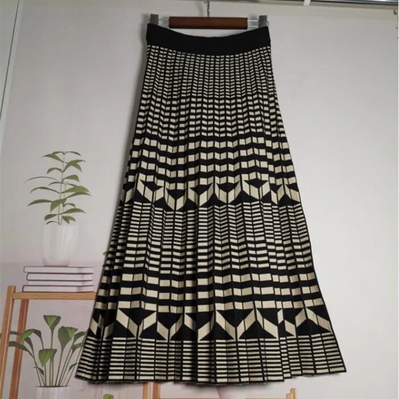 2021 Autumn Winter Plaid Knitted Skirt Elegant Women Hit Color Elastic High Waist Midi Pleated A Line Skirts Female
2021 Autumn Winter Plaid Knitted Skirt Elegant Women Hit Color Elastic High Waist Midi Pleated A Line Skirts Female