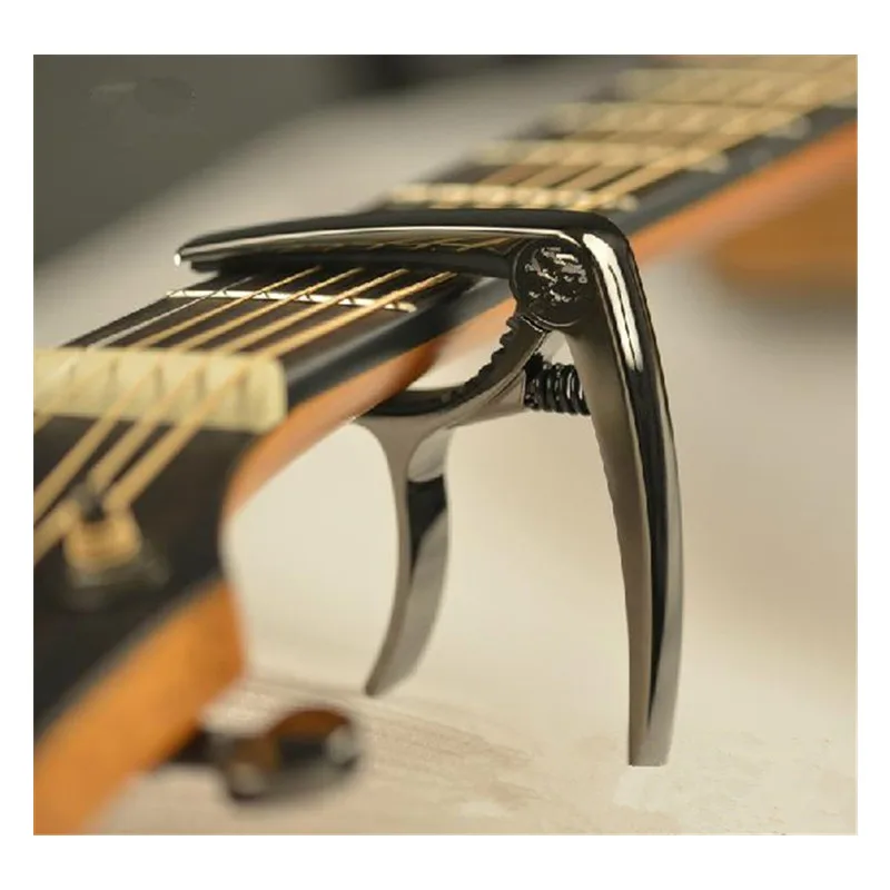 1Pcs Violin Ukulele Bass Folk Classical Electric Guitar Capo clamp Musical Instruments Accessories
1Pcs Violin Ukulele Bass Folk Classical Electric Guitar Capo clamp Musical Instruments Accessories