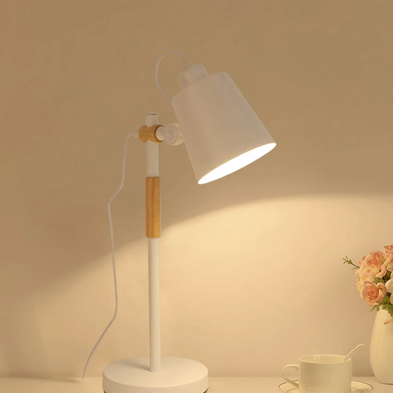 Modern Nordic Simple Table Lamp Iron Wood Adjustable Desk Lamp LED E27 for Study Bedroom Parlor Bookstore Hotel Bedside Children
Modern Nordic Simple Table Lamp Iron Wood Adjustable Desk Lamp LED E27 for Study Bedroom Parlor Bookstore Hotel Bedside Children