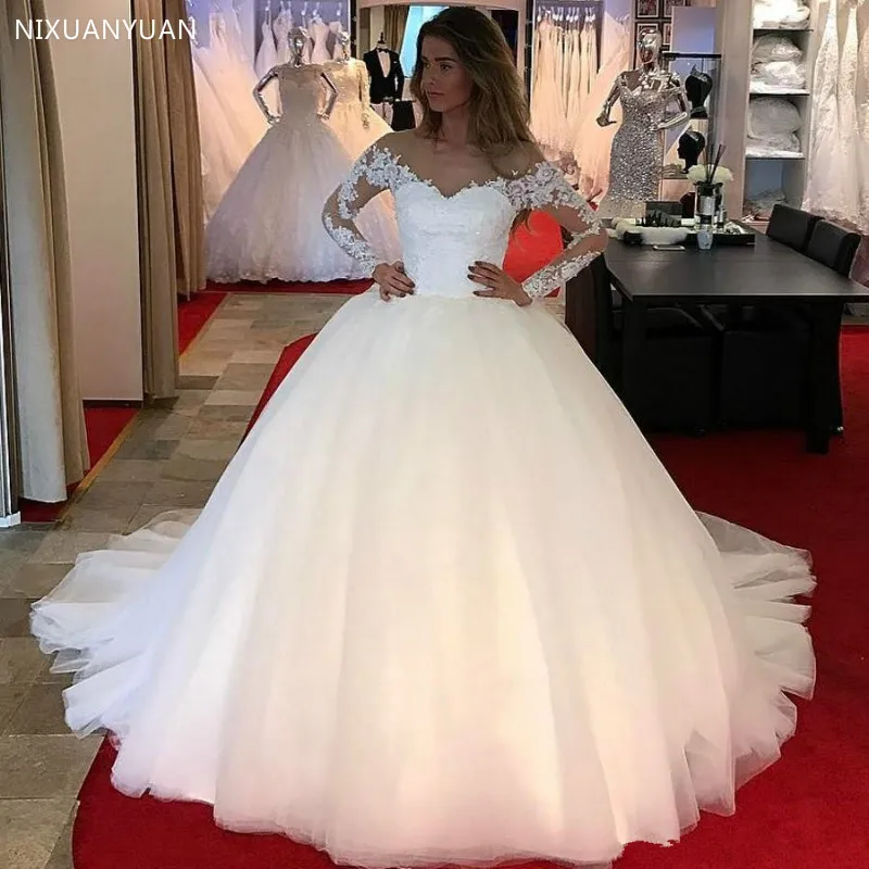 Long Sleeves Ball Gown Wedding Dress Lace Beads Sequins Puffy Wedding Gown Corset Back Modest Bridal Dresses Long Train
Long Sleeves Ball Gown Wedding Dress Lace Beads Sequins Puffy Wedding Gown Corset Back Modest Bridal Dresses Long Train