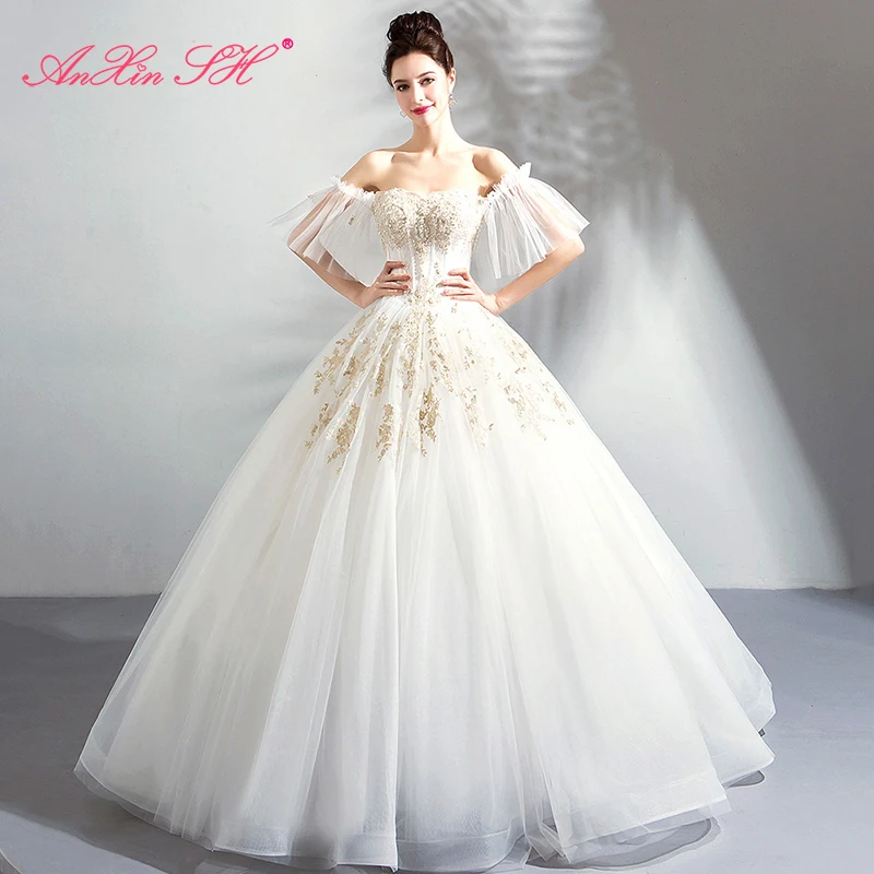 AnXin SH luxury boat neck golden embroidery white lace wedding dress princess beading pearls ruffles sleeve wedding dress 7808
AnXin SH luxury boat neck golden embroidery white lace wedding dress princess beading pearls ruffles sleeve wedding dress 7808