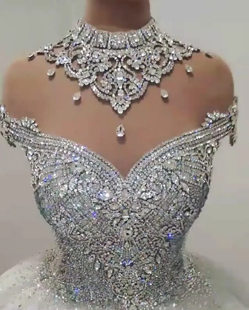 Sparkle Crystal Dubai Wedding Dress 2023 High Sheer Neck Luxury Bridal Gowns Backless Beaded Princess Robe De Mariee Custom Made
Sparkle Crystal Dubai Wedding Dress 2023 High Sheer Neck Luxury Bridal Gowns Backless Beaded Princess Robe De Mariee Custom Made