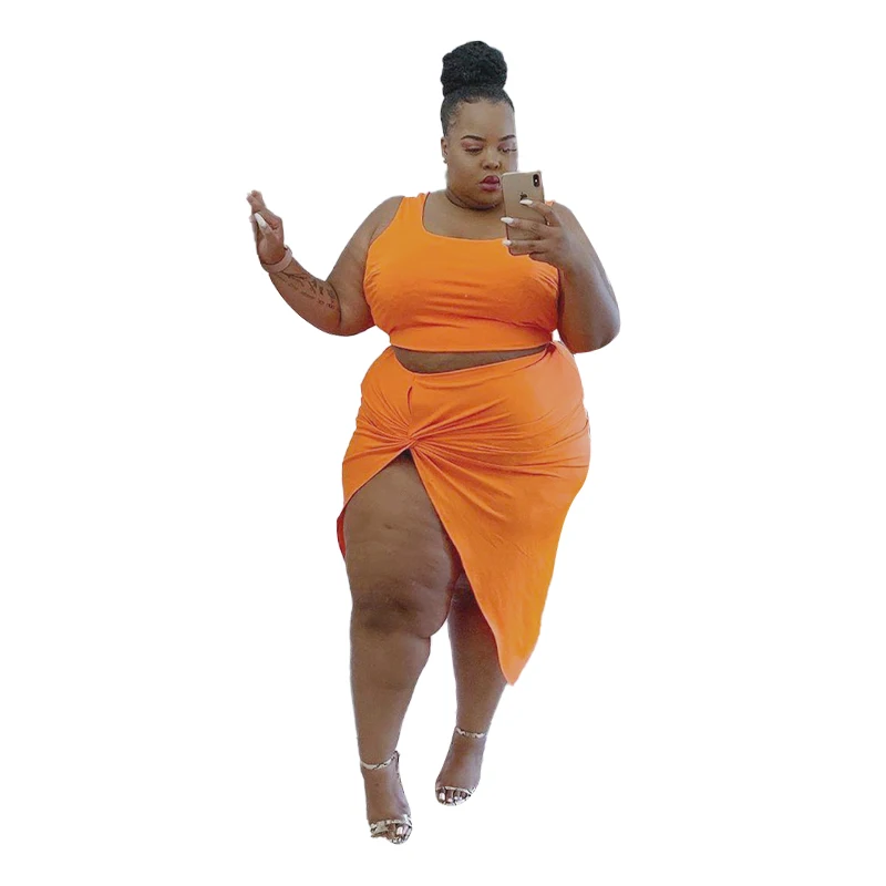European and American new style solid color fashion sexy umbilical leg slit sleeveless plus size women's two-piece suit
European and American new style solid color fashion sexy umbilical leg slit sleeveless plus size women's two-piece suit