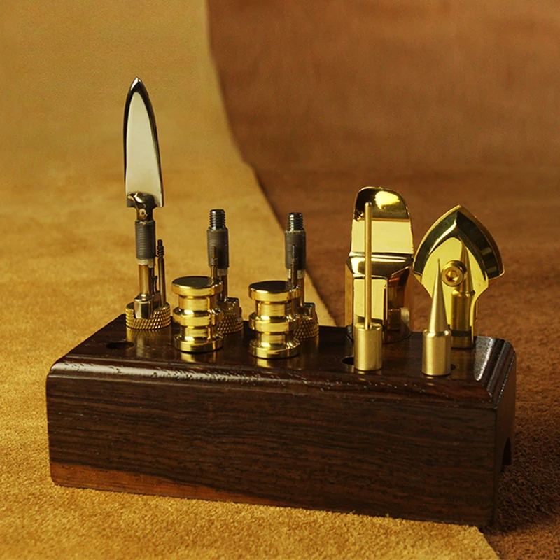 9pcs DIY leather tools Pure copper electric metal Special hot edge head set with black rosewood storage base Y
9pcs DIY leather tools Pure copper electric metal Special hot edge head set with black rosewood storage base Y