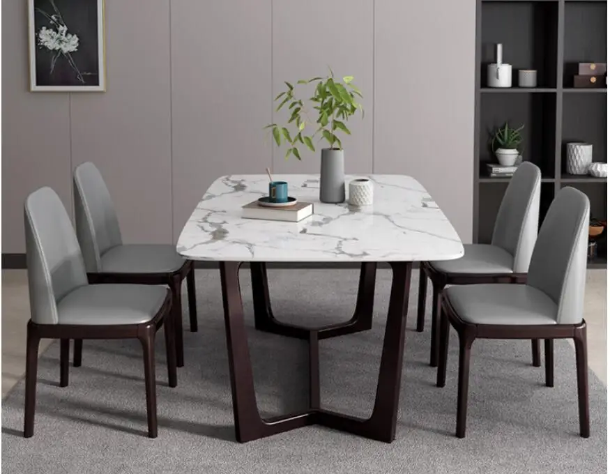Postmodern marble dining table and chair combination dining table household rectangular dining table
Postmodern marble dining table and chair combination dining table household rectangular dining table