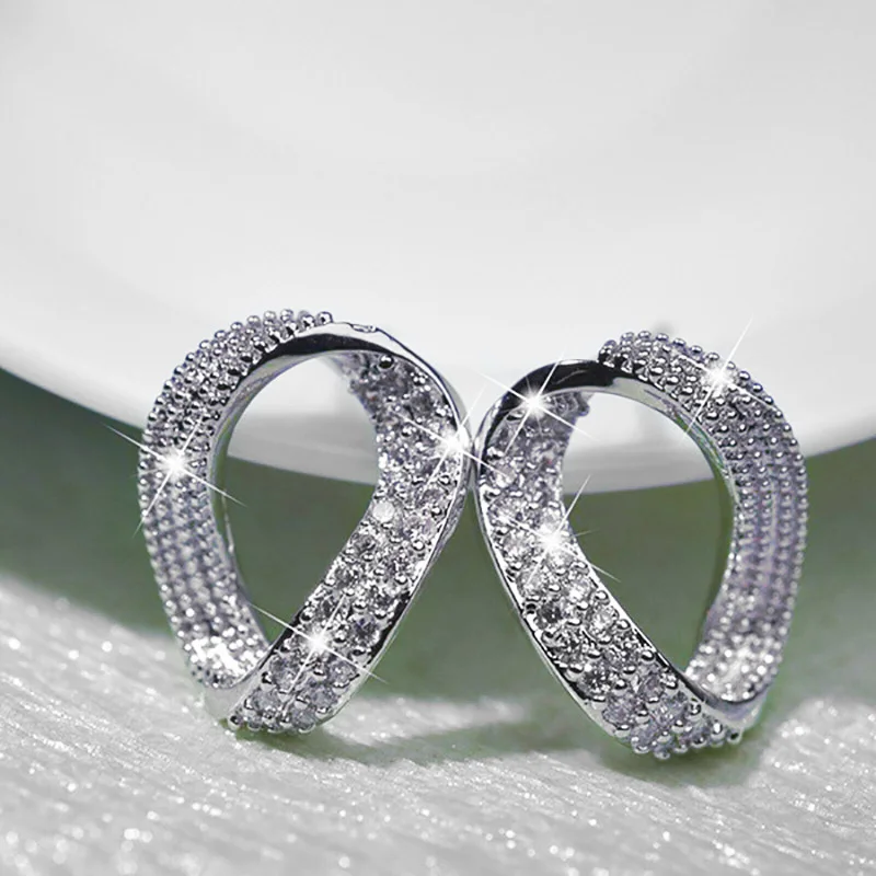 Huitan Crooked O Shape Stud Earrings Women Inlaid Shiny Cubic Zircon Simple Stylish Daily Wear Versatile Earring Fashion Jewelry
Huitan Crooked O Shape Stud Earrings Women Inlaid Shiny Cubic Zircon Simple Stylish Daily Wear Versatile Earring Fashion Jewelry