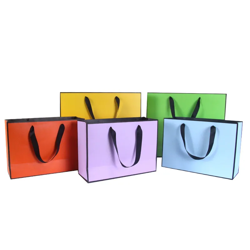 100Pcs/lot 4 Size New Creative design Black border Colorful kraft paper bag with handle Wedding Party Favor Paper Gift Bag
100Pcs/lot 4 Size New Creative design Black border Colorful kraft paper bag with handle Wedding Party Favor Paper Gift Bag