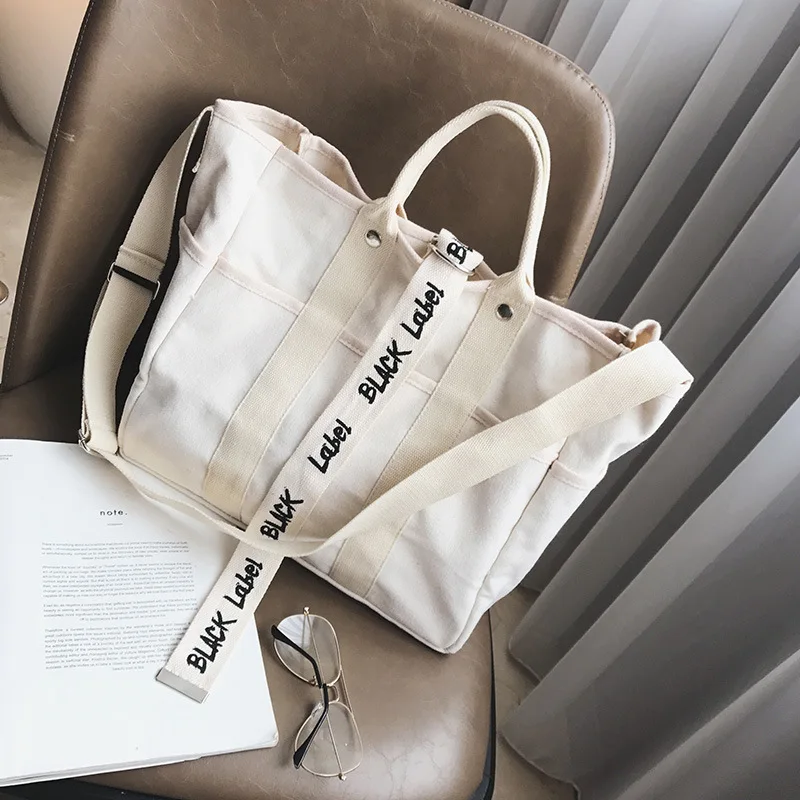 Luxury Designer Tote Bag Women Letter Printing Canvas Solid Handbags Lady Harajuku Style Fashion Large Capacity Crossbody Bags
Luxury Designer Tote Bag Women Letter Printing Canvas Solid Handbags Lady Harajuku Style Fashion Large Capacity Crossbody Bags