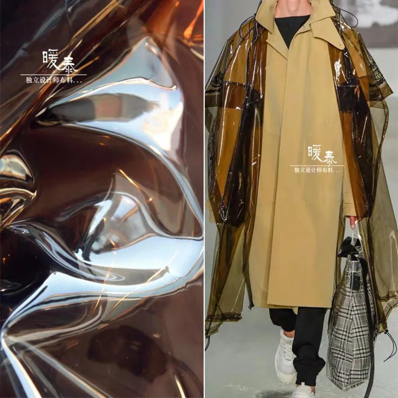 0.3mm TPU Fabric Transparent Tan PVC Jelly Plastic Film DIY Waterproof Raincoat Coat Crystal Bags Decor Clothes Designer Fabric
0.3mm TPU Fabric Transparent Tan PVC Jelly Plastic Film DIY Waterproof Raincoat Coat Crystal Bags Decor Clothes Designer Fabric