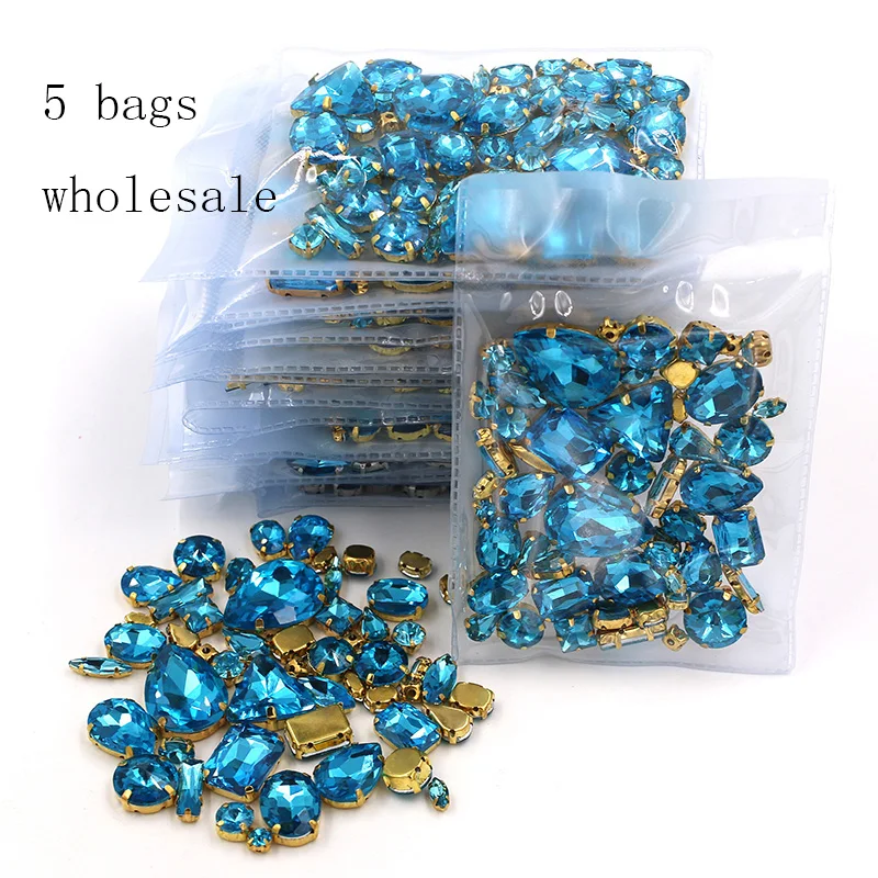 Hot sale Wholesale 5 bags mixed shape sew on glass Lake blue gold base rhinestones diy dress/Clothing accessories
Hot sale Wholesale 5 bags mixed shape sew on glass Lake blue gold base rhinestones diy dress/Clothing accessories