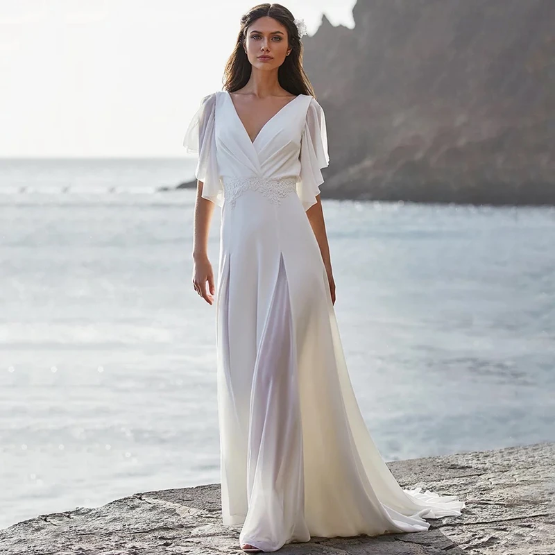 2022 Simple Beach Wedding Dresses A-line V-neck Batwing Sleeves Bridal Gowns Lace Appliques Open Back Sweep Train
2022 Simple Beach Wedding Dresses A-line V-neck Batwing Sleeves Bridal Gowns Lace Appliques Open Back Sweep Train
