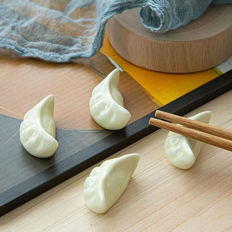 4pcs/set Ceramic Crafts Chopstick Rest Shelf Support Household Kitchen Tableware Simulation Dumplings Chopstick Holder Stand
4pcs/set Ceramic Crafts Chopstick Rest Shelf Support Household Kitchen Tableware Simulation Dumplings Chopstick Holder Stand