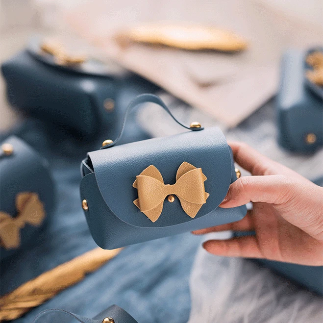 10pcs Mini PU Leather Bag Shaped Gift Box Candy Bags Gift Souvenir Packaging Bags Baby Shower Wedding Party Favors
10pcs Mini PU Leather Bag Shaped Gift Box Candy Bags Gift Souvenir Packaging Bags Baby Shower Wedding Party Favors