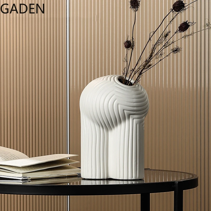 Abstract Art Ceramic Vase Living Room Dried Flower Illustration Accessories Light Luxury High-end Floral Home Decoration
Abstract Art Ceramic Vase Living Room Dried Flower Illustration Accessories Light Luxury High-end Floral Home Decoration