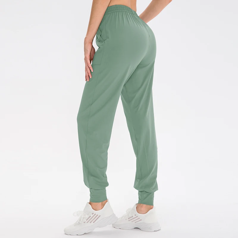 Tie Feet Pants Yoga Pockets Casual Fitness Female Leggings Running Workout Gym Clothing Seamless Loose Women's Sports Pants
Tie Feet Pants Yoga Pockets Casual Fitness Female Leggings Running Workout Gym Clothing Seamless Loose Women's Sports Pants