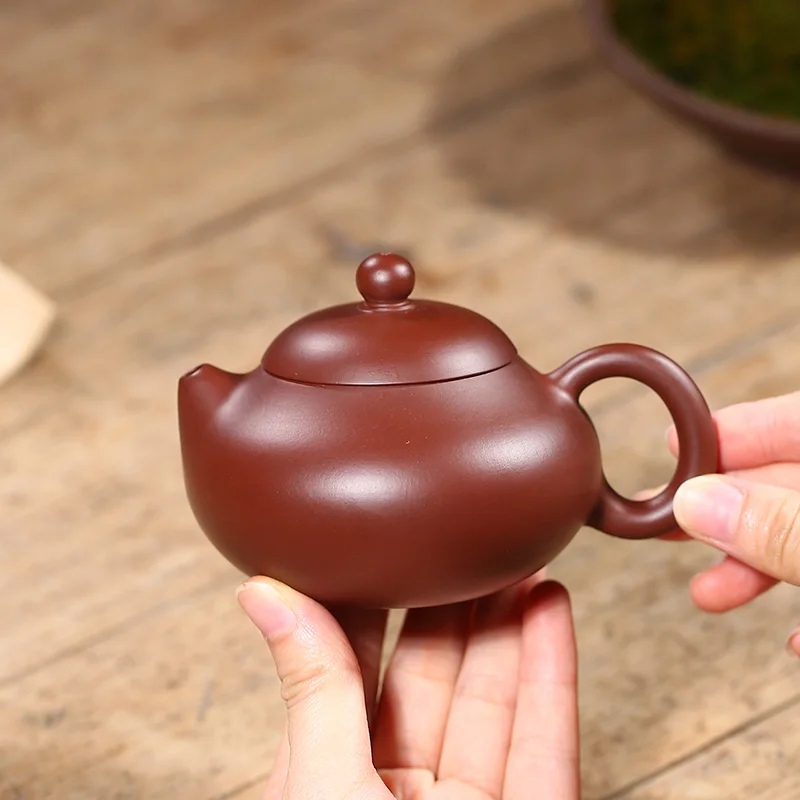 |pure handmade purple sand pot purple Zhu mud Wendan pot flat Xishi pot household Kung Fu tea pot set special price
|pure handmade purple sand pot purple Zhu mud Wendan pot flat Xishi pot household Kung Fu tea pot set special price
