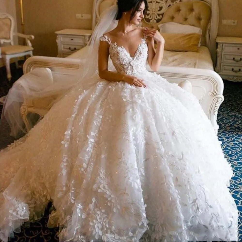 2022 Elegant 3D Floral Appliques Line Wedding Dresses Sheer Jewel Neck Cap Sleeves Luxury Arabic Bridal Gowns Country
2022 Elegant 3D Floral Appliques Line Wedding Dresses Sheer Jewel Neck Cap Sleeves Luxury Arabic Bridal Gowns Country