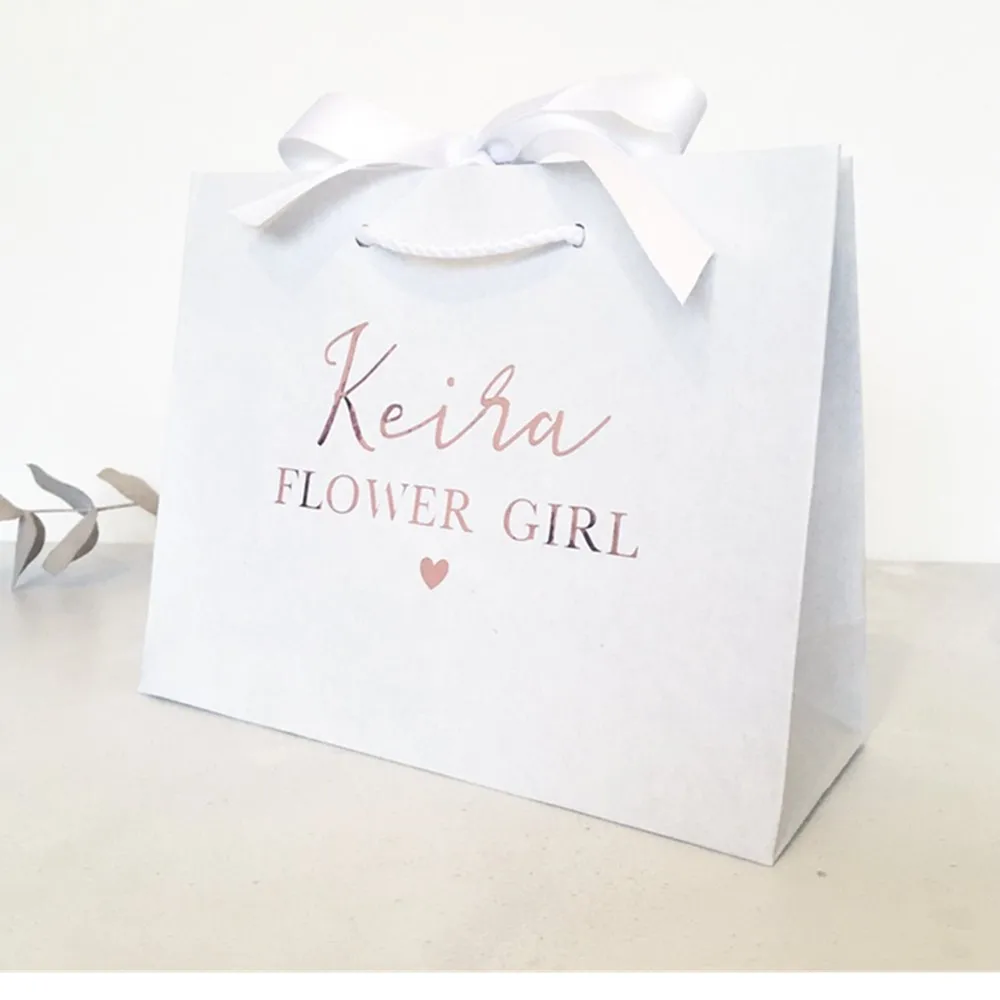Personalised White Gift Bag with Ribbon. Rose Gold Bridesmaid makeup Bag. Flower Girl, Bridal Party Gifts Gold Name Gift Bag
Personalised White Gift Bag with Ribbon. Rose Gold Bridesmaid makeup Bag. Flower Girl, Bridal Party Gifts Gold Name Gift Bag