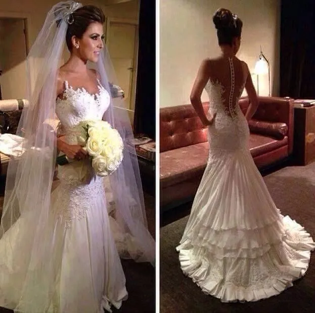 2015 Illussion Jewel V Neck Appliqued Beaded Sheer Back Tiered Mermaid Wedding Dresses Bridal Gowns
2015 Illussion Jewel V Neck Appliqued Beaded Sheer Back Tiered Mermaid Wedding Dresses Bridal Gowns