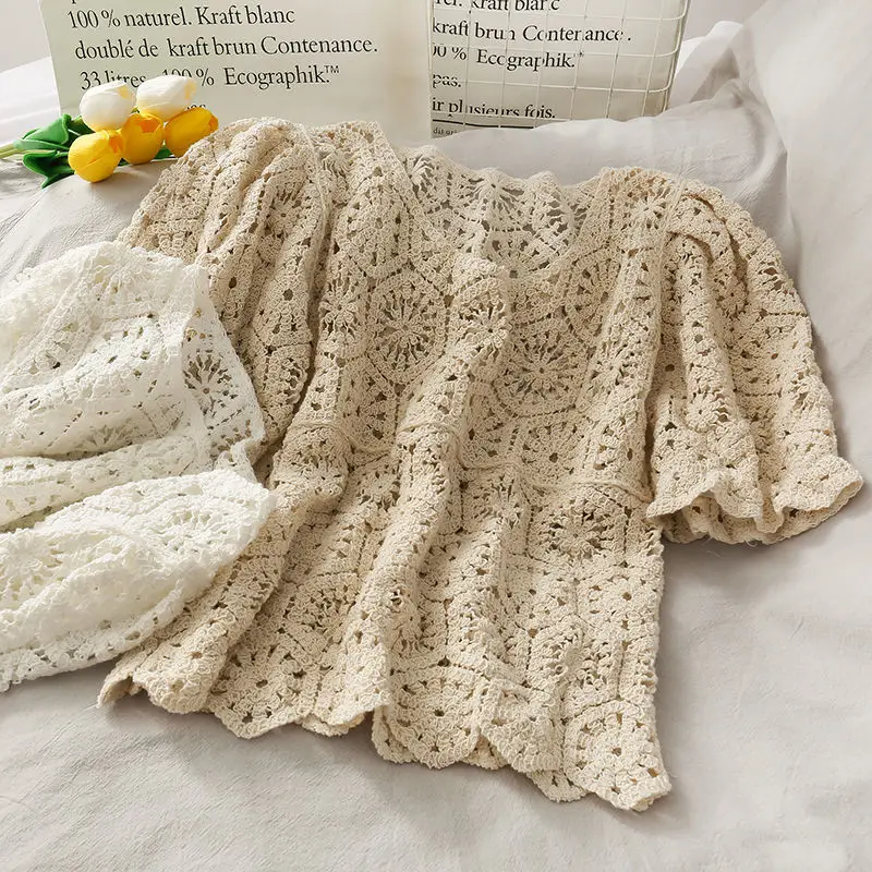 Short-sleeved lace pullover women's knitted summer new Korean round neck wild hollow crochet temperament sweet
Short-sleeved lace pullover women's knitted summer new Korean round neck wild hollow crochet temperament sweet