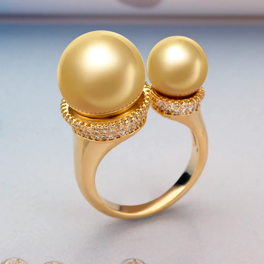 New Trendy Round Pearl Statement Rings for Women Cubic Zircon Finger Rings Beads Charm Ring Bohemian Beach Jewelry Gifts
New Trendy Round Pearl Statement Rings for Women Cubic Zircon Finger Rings Beads Charm Ring Bohemian Beach Jewelry Gifts