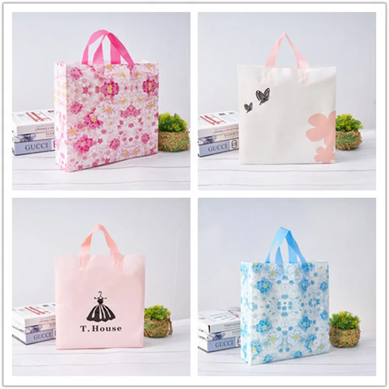 50pcs Thick Large Plastic Bags With Handle Pink Floral Gift Bag high quality Clothing Store Packaging Bags Wedding candy bag
50pcs Thick Large Plastic Bags With Handle Pink Floral Gift Bag high quality Clothing Store Packaging Bags Wedding candy bag