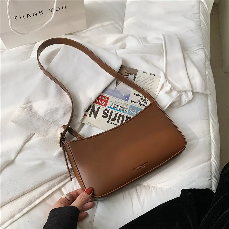Women Bag Vintage Leather Armpit Shoulder Pouch Solid Color 2021 Trend Shoulder Bags For Women Small Clutch Purse Luxury Handbag
Women Bag Vintage Leather Armpit Shoulder Pouch Solid Color 2021 Trend Shoulder Bags For Women Small Clutch Purse Luxury Handbag