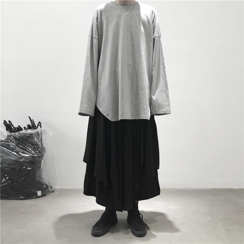 Autumn new ladies multilateral split design solid color round collar splicing long sleeve T-shirt loose fashion trend
Autumn new ladies multilateral split design solid color round collar splicing long sleeve T-shirt loose fashion trend