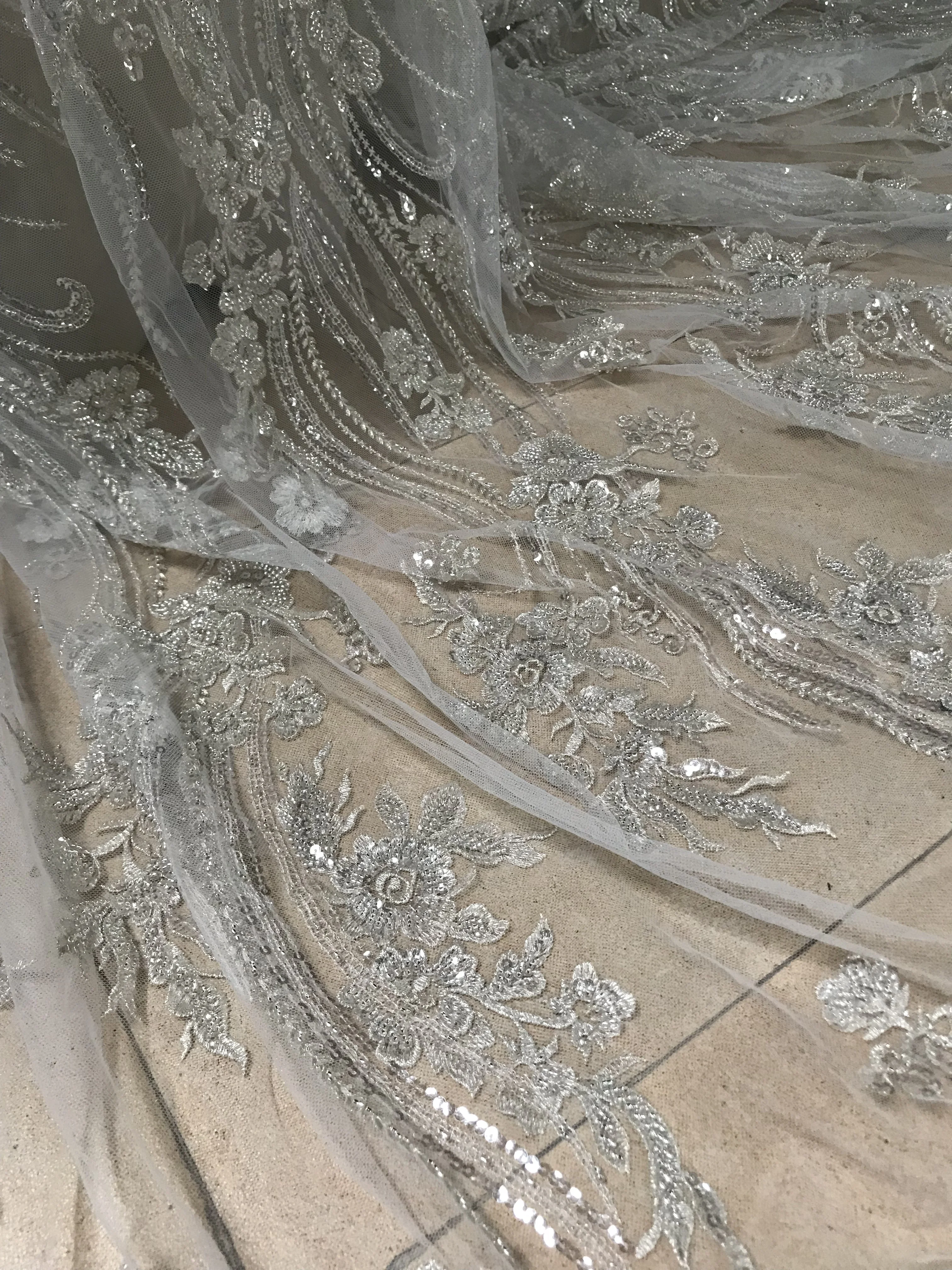 heavy beaded embroidered net lace fabric african tulle lace S-32687 with beads for wedding dress
heavy beaded embroidered net lace fabric african tulle lace S-32687 with beads for wedding dress