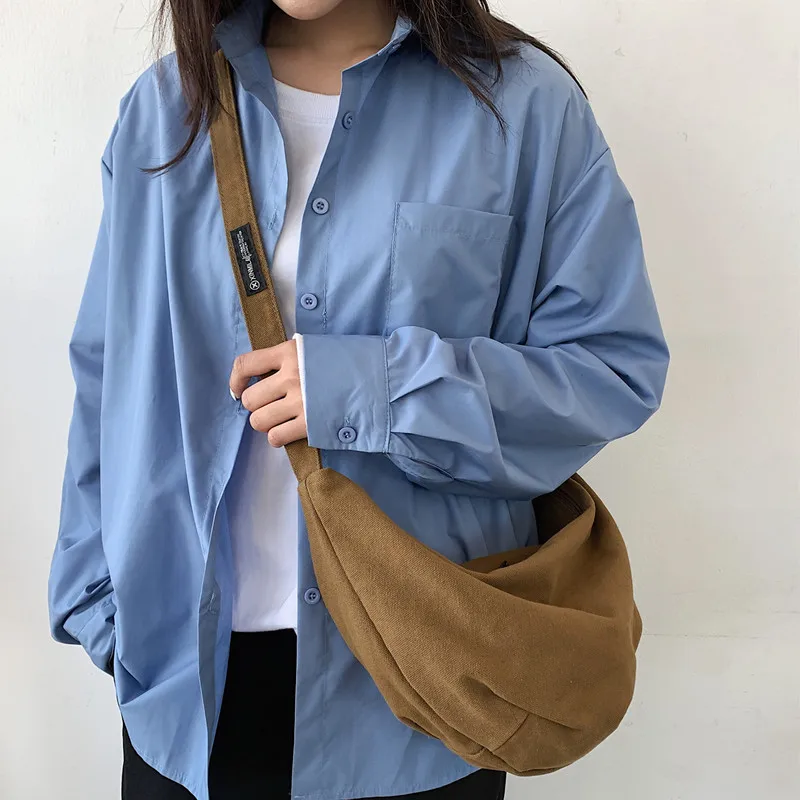 New ins canvas bag Japanese lazy wind solid color messenger bag for men, women, Japan and South Korea simple shoulder jiaozi bag
New ins canvas bag Japanese lazy wind solid color messenger bag for men, women, Japan and South Korea simple shoulder jiaozi bag