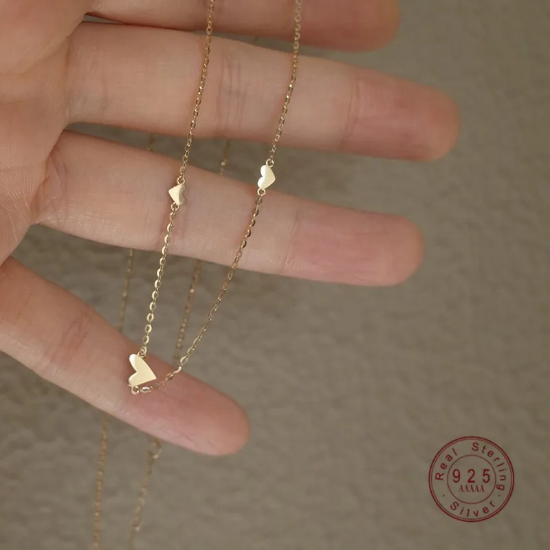HI MAN S925 Sterling Silver Gold-Plated Three Small Heart Necklace Women Cold Wind Temperament Pendant Simple Clavicle Chain
HI MAN S925 Sterling Silver Gold-Plated Three Small Heart Necklace Women Cold Wind Temperament Pendant Simple Clavicle Chain