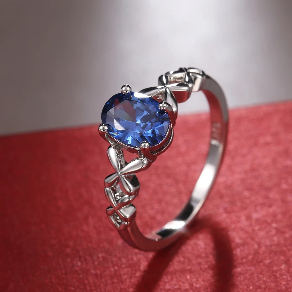 Huitan Luxury Deep Blue Wedding Ring Classic Simple 4 Claws Zircon Stone High Quality Women Ring Engagement Party Female Jewelry
Huitan Luxury Deep Blue Wedding Ring Classic Simple 4 Claws Zircon Stone High Quality Women Ring Engagement Party Female Jewelry