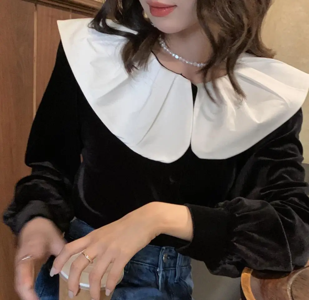 French elegant velvet shirt Autumn and winter temperament is thin and wild Korean style doll lapel loose velvet shirt Black top
French elegant velvet shirt Autumn and winter temperament is thin and wild Korean style doll lapel loose velvet shirt Black top