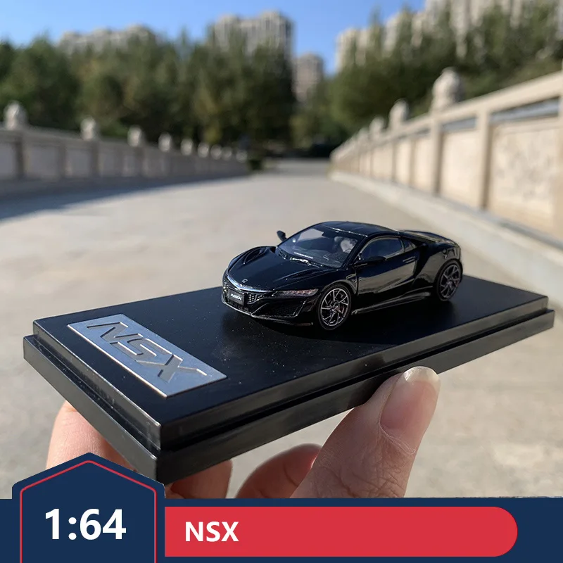 Оригинальная модель спортивного автомобиля NSX с ЖК-дисплеем, модель из сплава 1:64, модель автомобиля, коллекционная Подарочная Декорация
Оригинальная модель спортивного автомобиля NSX с ЖК-дисплеем, модель из сплава 1:64, модель автомобиля, коллекционная Подарочная Декорация